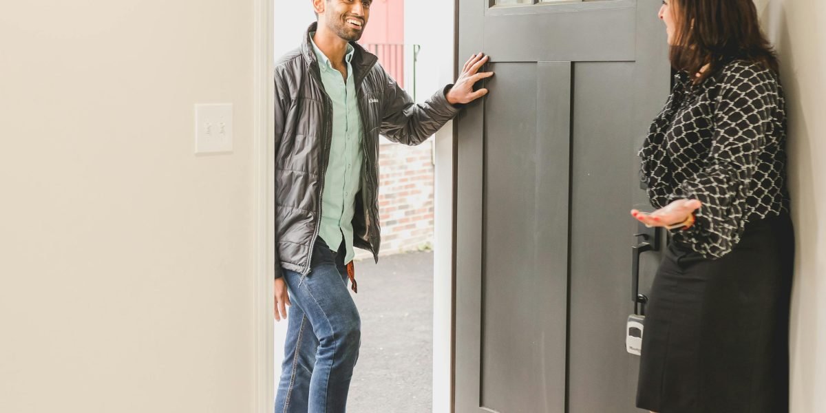 A real estate expert providing personalized guidance to a client interested in high-end properties.