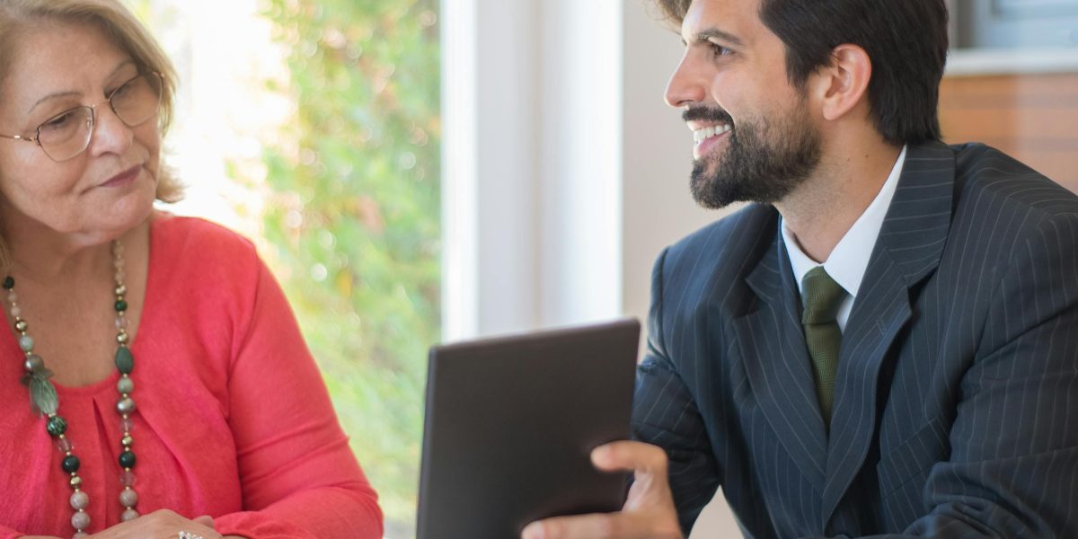 A professional discussing career advancement or investment strategies with an expert, symbolizing the search for reliable guidance.