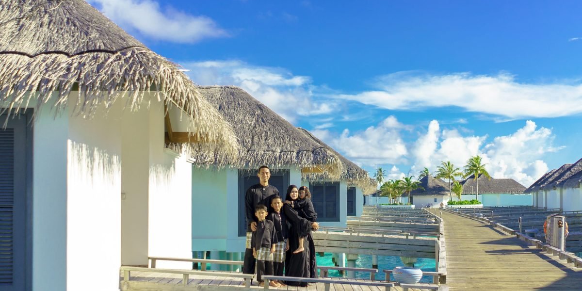 A family enjoying the exclusive beach access and resort-style amenities on Palm Jumeirah.