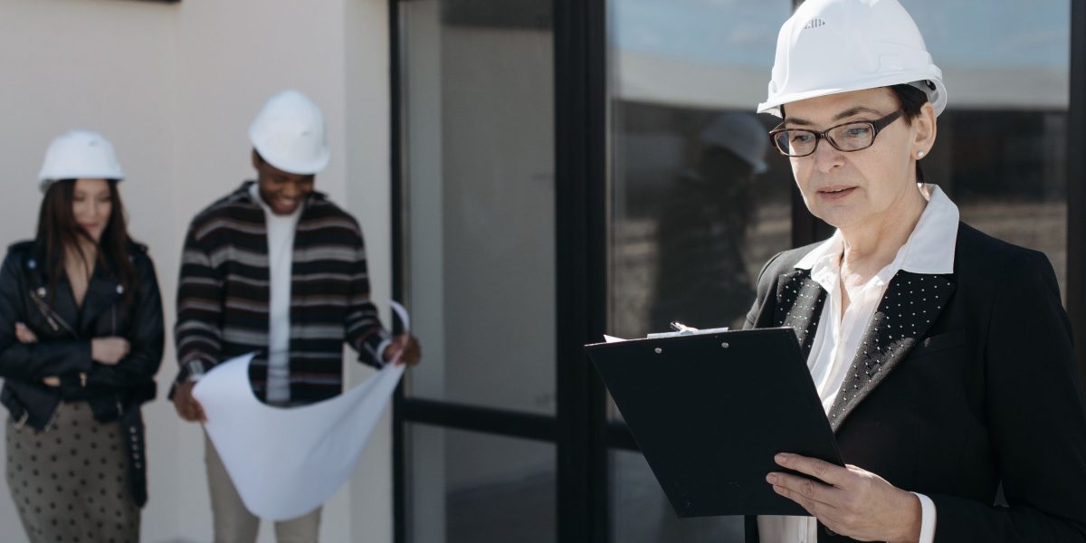 A person carefully examining documents and details, representing the thorough due-diligence required for luxury property investments.