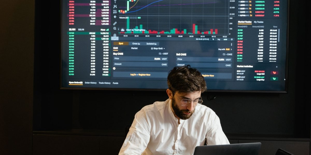 An investor thoughtfully considering various property market options and strategies.