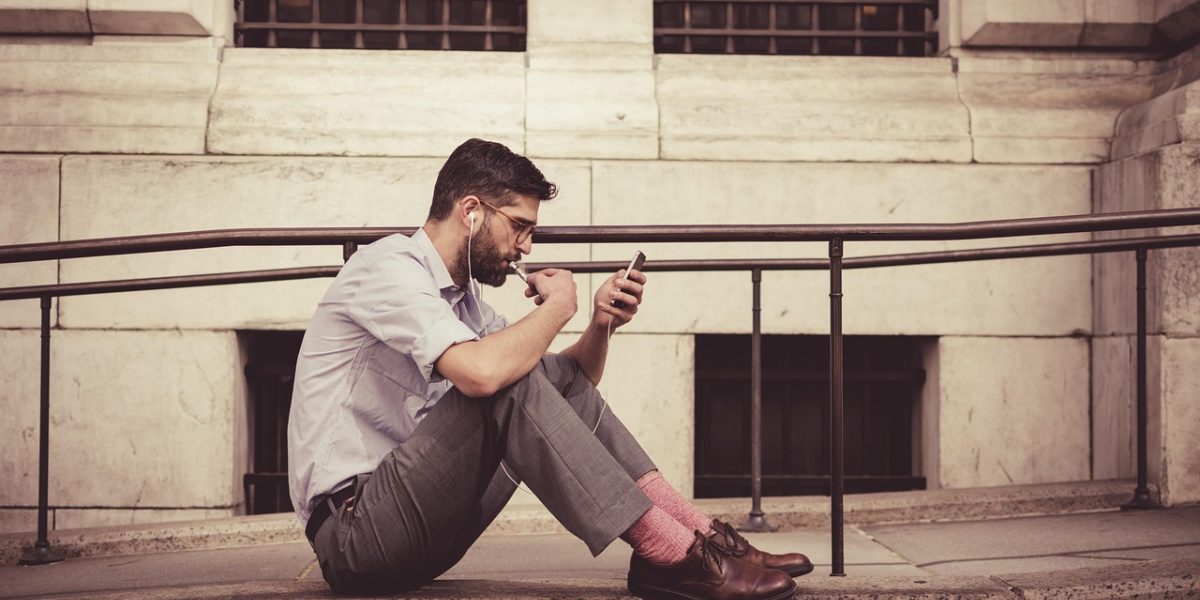 A person contemplating investment opportunities in a rapidly developing urban landscape.